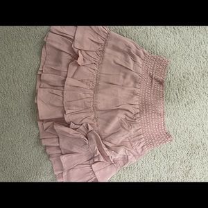 Pale pink mini skirt